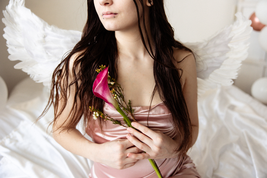 Boudoir image with cosplay angel wings